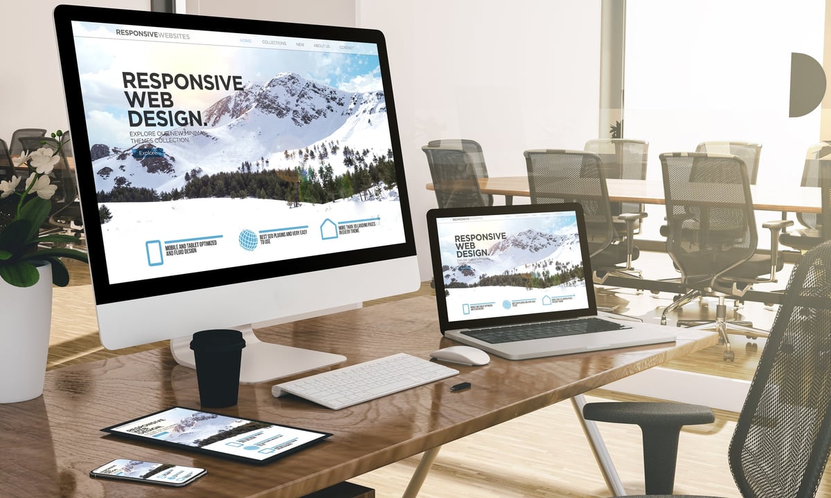 Modern office with responsive web design displays